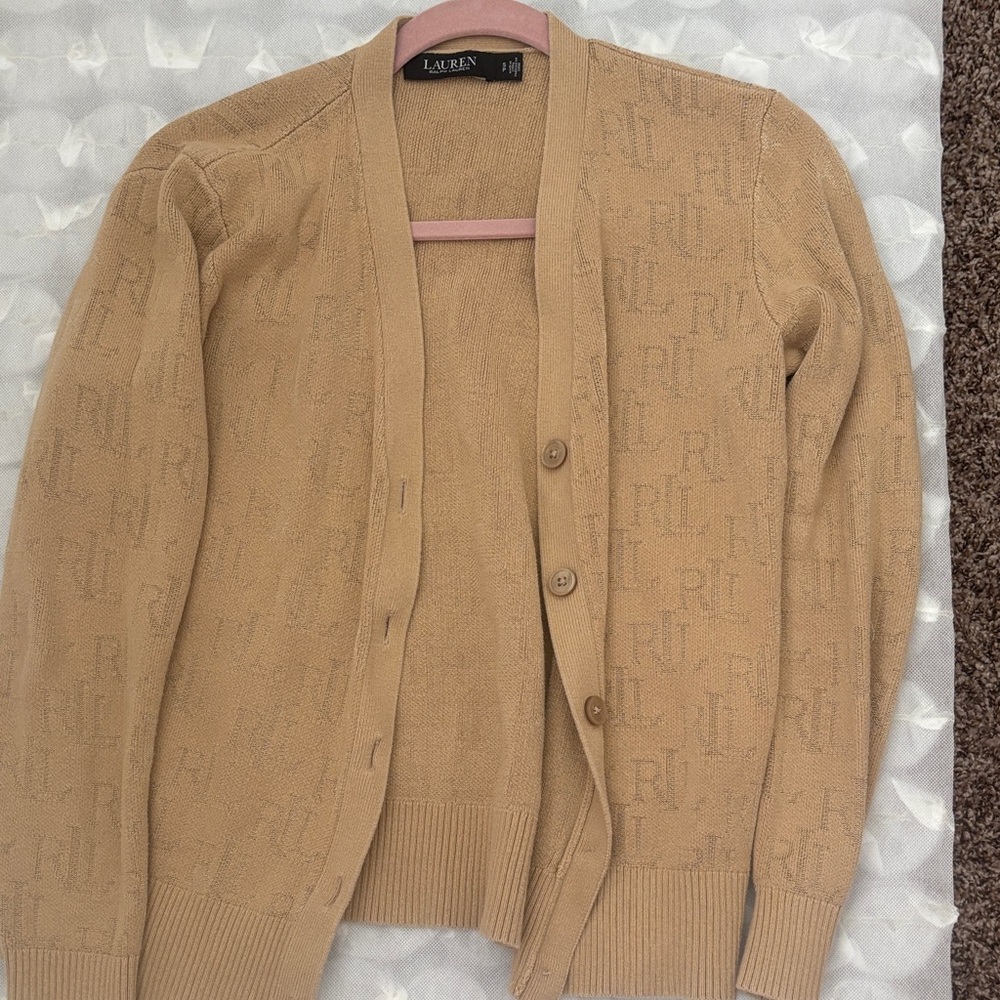 Tan woman’s Sweater